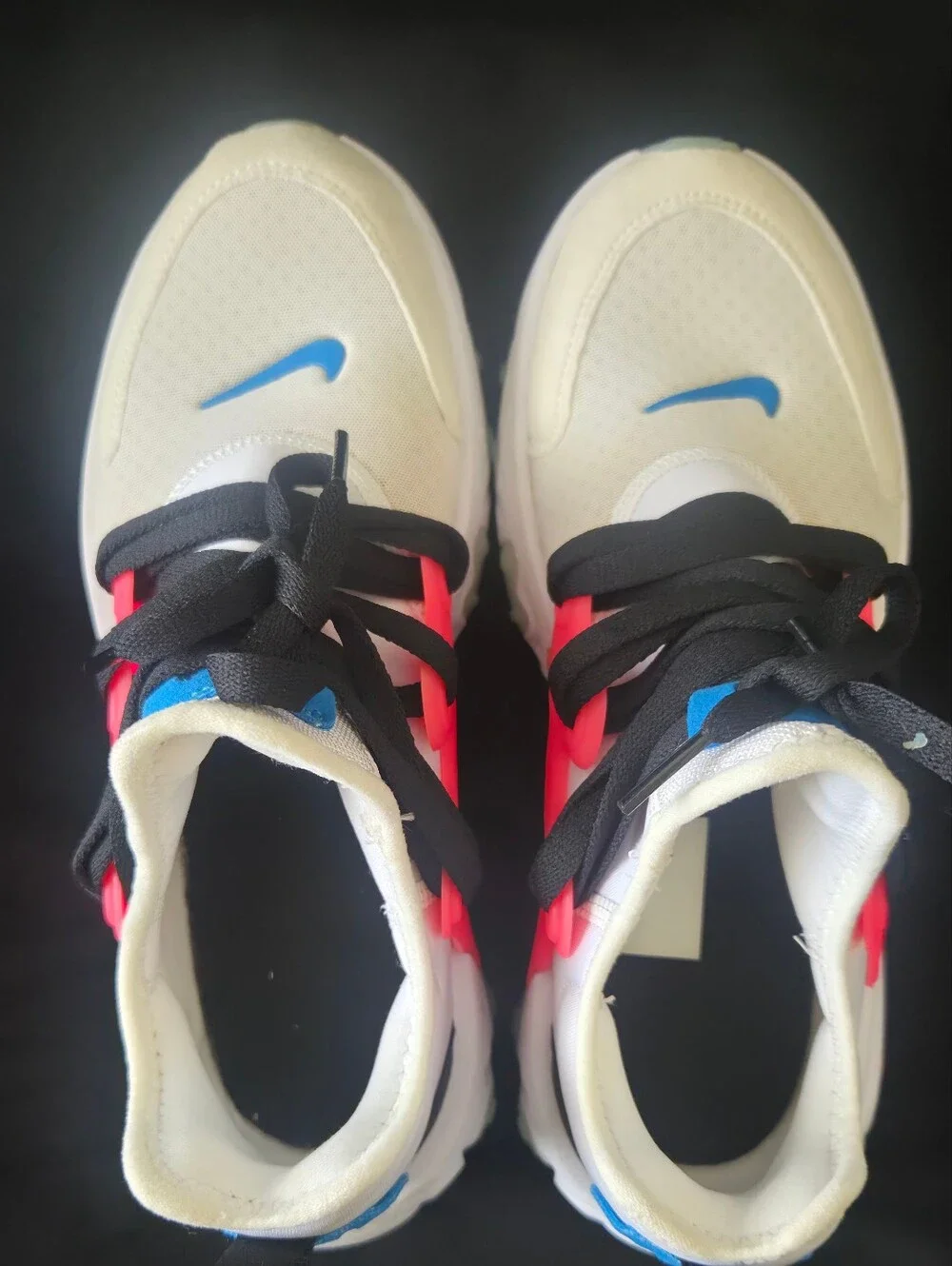 Nike White Athletic Shoes with Coral and Blue Accents